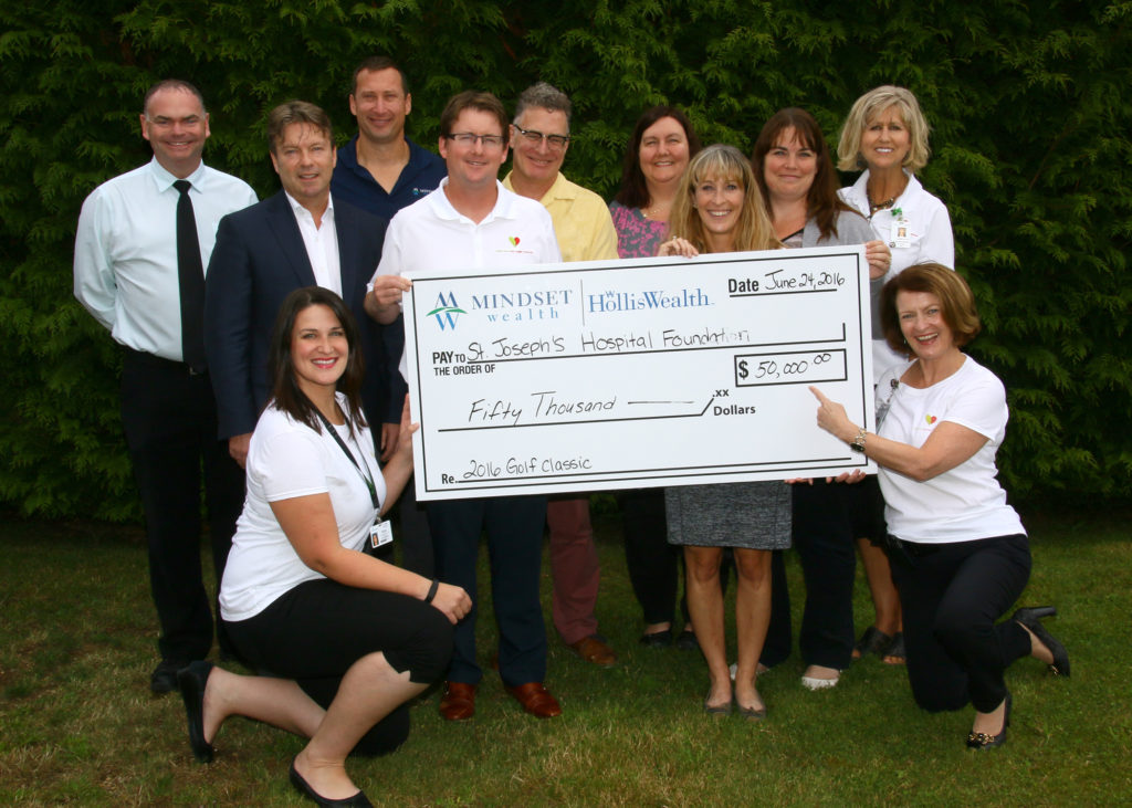 Committee members from the 26th Annual St. Joseph’s Hospital Foundation Golf Classic present a cheque to the Comox Valley Healthcare Foundation (formerly St. Joseph’s Hospital Foundation) and Jane Murphy, President & CEO of St. Joseph’s Hospital. This year’s golf event raised a record-breaking $52,000 to purchase a new Fluid Management System for the Operating Room. From left to right, back row: Cyriel DeBruyne, Russ Keil, Russ Wigle, Robert Mulrooney, Peter Diespecker, Randi Reid, Meghan Liddle, Laura Nickel, Lynn Dashkewytch. Bottom Row, Katie Maximick and Jane Murphy (Jim Peacock photo). 